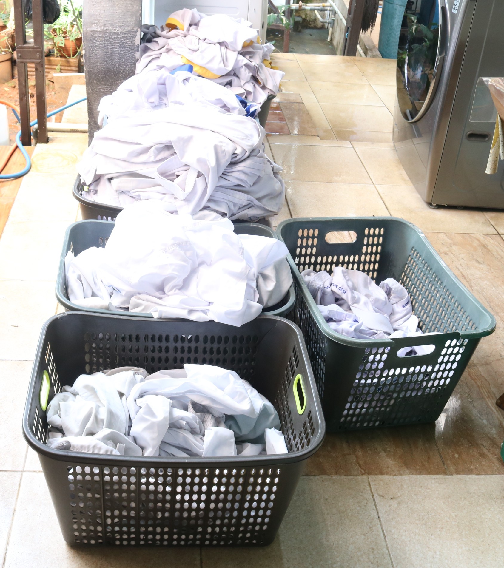 [team] team member (for a garment care service)